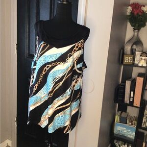 #583. Black and White Asymmetrical Tank Top with Cut Out Design